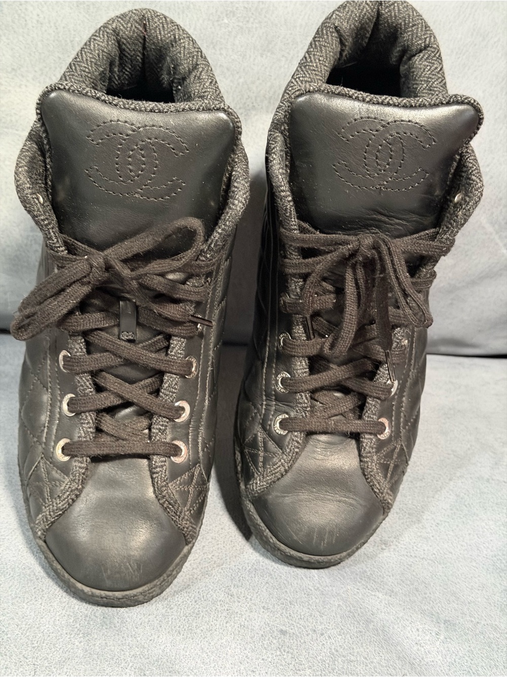 CHANEL Black CC Quilted Lace-Up High-Top Sneakers
